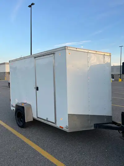 Selling a well kept 6x10(+2) 2016 Cargo Express EX DLX Series Enclosed Cargo Trailer. One light does...