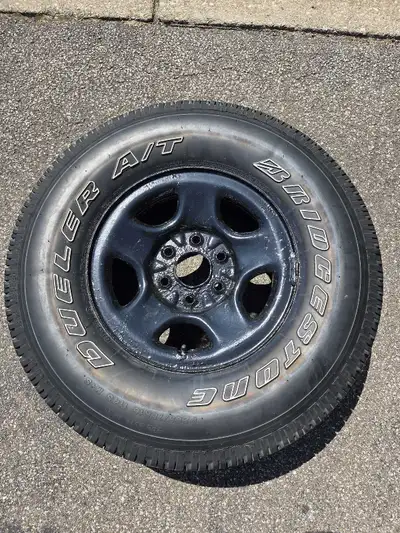 Chevrolet rim and tire from a silverado $40 It was on a 2000 silverado and was the spare. Never been...