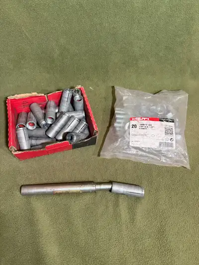 I'm offering a collection of Hilti drop-in anchors, including a partial box and a sealed bag of Hilt...