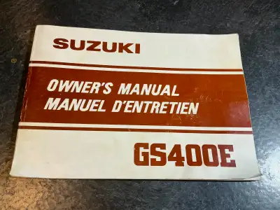 1982 Suzuki GS400E Owner's Manual Printed in January 1982 OEM part number 99011-44420-28B This Suzuk...