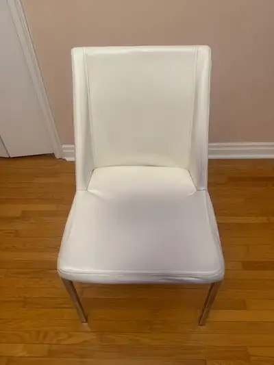White faux leather chair, View more