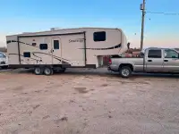 Fifth wheel camp and truck
