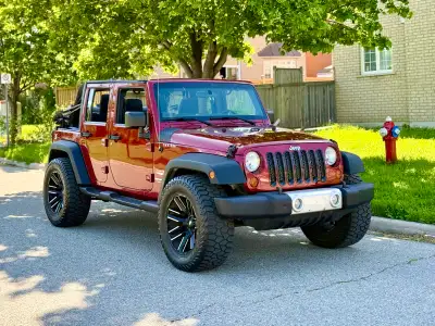For sale 2011 Jeep Wrangler Unlimited Sahara, 4-door, automatic transmission, and legendary 4x4 capa...