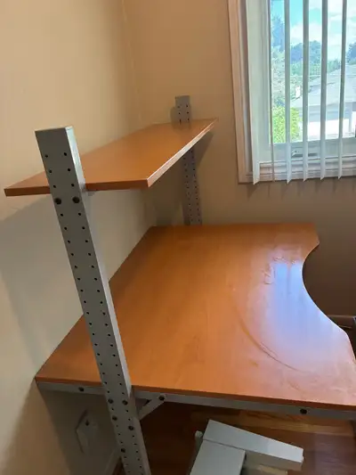 Modern two-tier 48” computer desk in excellent used condition., View more