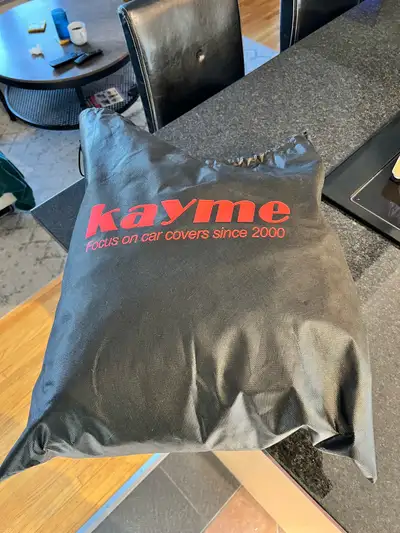 SUV car cover , new , waaay too tight for our SUV , more for a CRV,Pilot , X3 maybe ?! Has mirror po...