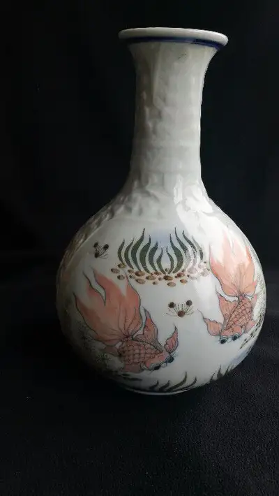 A Chinese Celadon Underglaze Vase, View more