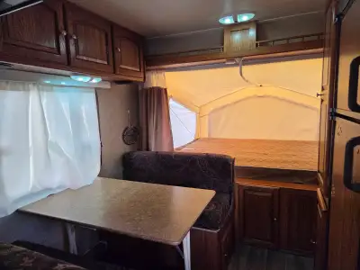 17 Ft Hybrid Trailer with two pop-out tent ends is in excellent condition, comes with TV, Stereo, La...
