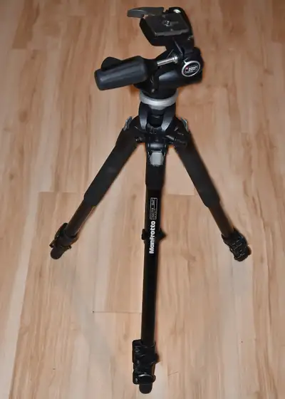 Manfrotto 190XProB tripod, c/w a Manfrotto 804RC2 3 way head. Like new condition. $150.00 OBO