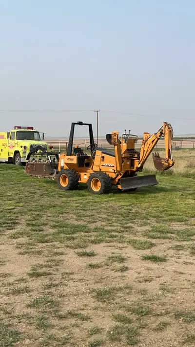 55Hp RT560. Can trench 5’, backhoe attachment on front. 6 way backfill blade. 1250hrs. New fluids an...