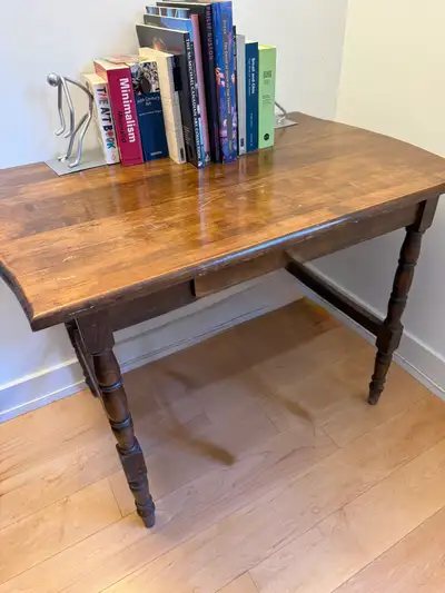 This is an antique library table with a drawer, perfect as a compact writing desk, with a beautiful...