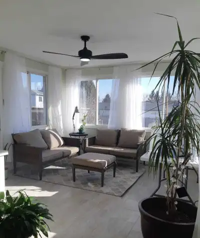 Welcome to this spacious two-bedroom main floor apartment with an additional sunroom. The residence...