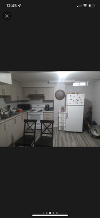One room available in two bedroom basement  