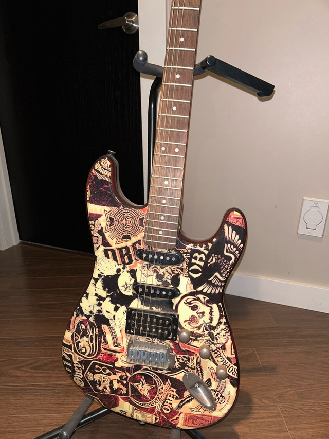 Squire strat obey propaganda guitar in Guitars in Winnipeg - Image 4