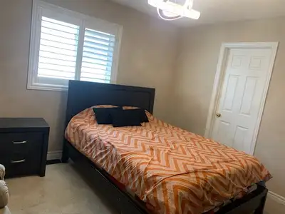 Modern bright, spacious one furnished bedroom featuring a large walk-in closet, and a private en-sui...