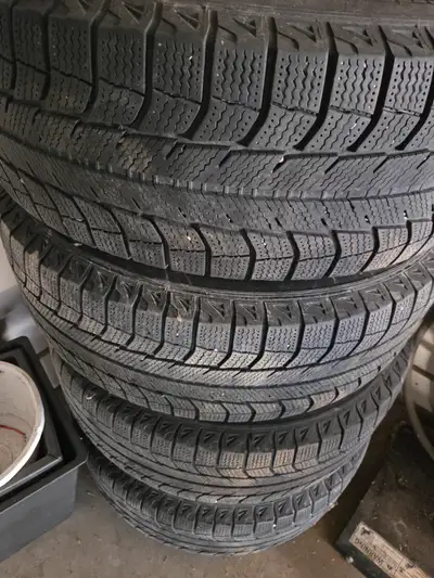 Set of 4 black steel winter rims with very good Michelin Latitude X Ice tires. Size 245/65R 17 off a...