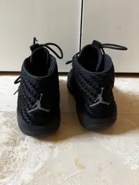 Nike Air Jordan high top black woven shoes, black soles US 5Y