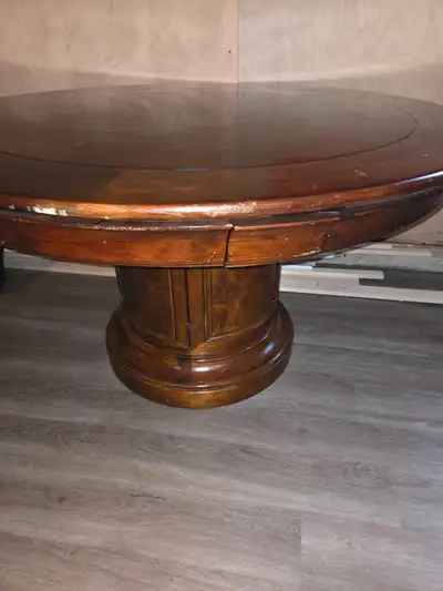 Beautiful poker/games/dining table made of solid cherry wood. Seats 6 people and has 6 full-extensio...