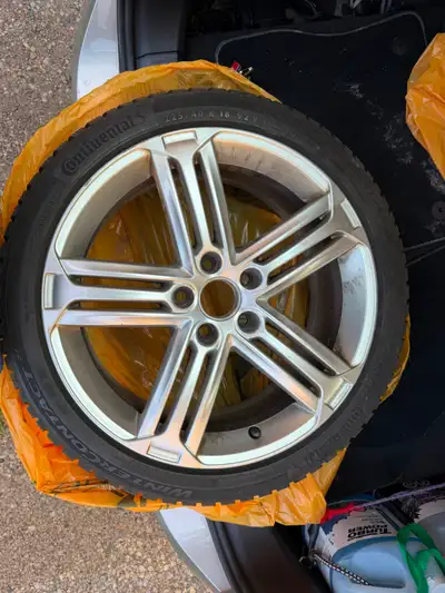 Selling a complete rim set + winter setup — 4x genuine OEM Volkswagen 18" Talladega wheels mounted w...