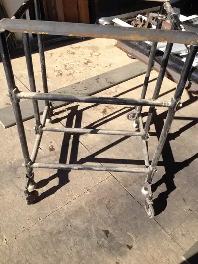 Portable equipment stand. 21” x24” x 32” high . Has wheels and fixed legs which can be raised and lo...