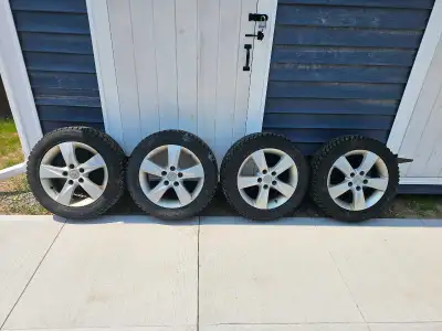 Brand new winters. Were on a 2013 Hyundai Elantra. On Hyundai rims. Tires have a half season on them...