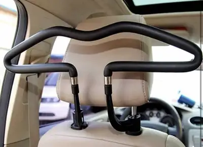 Keep your car neat and your clothes wrinkle-free with this gently used car coat hanger! This handy g...