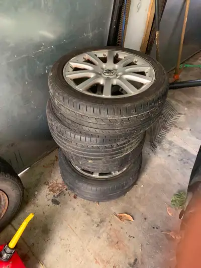 VW RIMS FROM A 2005-06 JETTA NEED GONE ASAP 250 OBO 3 TIRES ARE GOOD. ONE IS OK 5x112 BOLT PATTERN T...