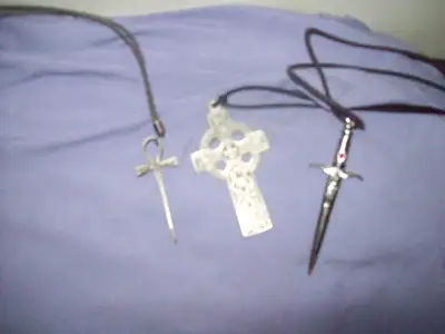 Necklaces, like new, 1 Celtic cross (2inch). 1 Ankh /Sword (2inch),. , 2 Crystal necklaces, 1 sliver...