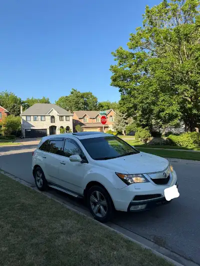 2012 Acura MDX AWD Clean and well-maintained 2012 Acura MDX in white. Reliable 3.7L V6 engine, AWD,...
