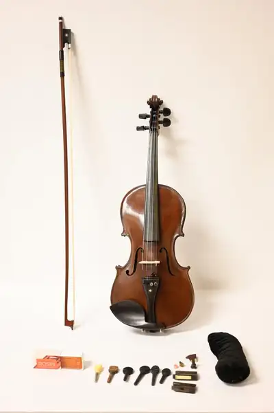 Violin Trade Mark Made in Japan with Vintage wood Case. Please see pictures for more details. We are...