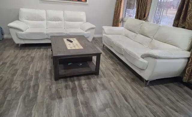 2 White Three-Seater Sofas & Dark Wood Table64519993522947120