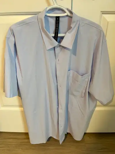 Pale purple-white, collared, button down mens shirt.