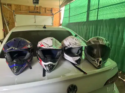 From right to left Grey with windscreen- size 58 cm, medium White with pink floral- size medium 52 c...