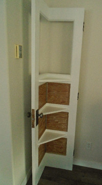 Repurposed vintage door corner display shelf