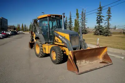 12,085 Hours Clean, solid running Deere 310SK ready to go to work. This machine has been gone throug...