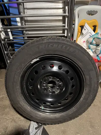 Lightly used Michelin X-Ice Snow 225/60R17 on steel rims.