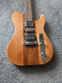 Beautiful Godin made in Canada natural finish electric guitar