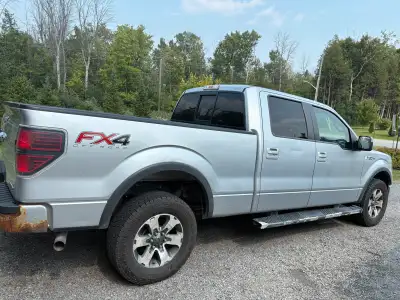 This is a 2013 Ford F150 FX4 Super Crew, a reliable and rugged truck ready for any adventure or job....