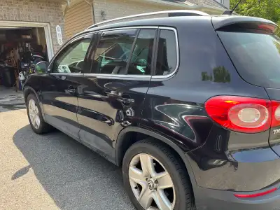 Selling my reliable 2011 Volkswagen Tiguan Highline, a compact SUV perfect for city driving and week...