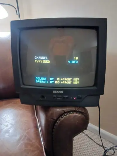 13 inch Sears crt tv . Works fine . Has both composite and coaxial hookups . No remote .