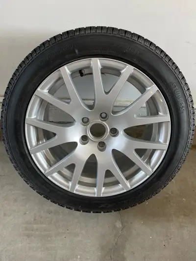 Used 225/50R17 Toyo winter tires mounted on genuine Audi rims, includes Audi protective covers. Thes...
