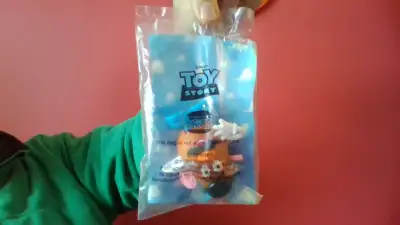 2 sealed Fast Food Toys - Toy Story / Hot Wheels, View more