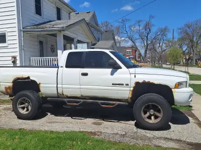 2001dodge ram sport 4x4. Lifted. New timing chain water pump. Has Bushwacker Fender Flares. New rock...