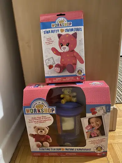 I am selling a brand new build a bear stuffing station also including an additional bear with stuffi...
