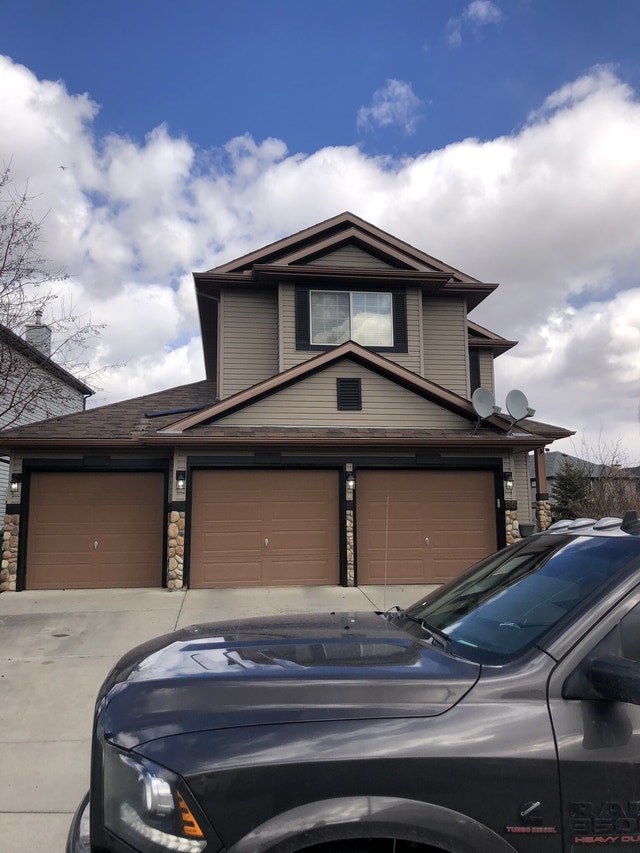 Exterior EstimatesJames Hardie Board Siding & Eavestrough Fence