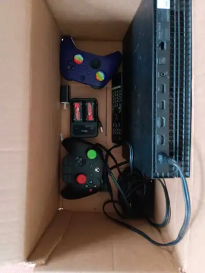 Xbox one X with pro controller , View more