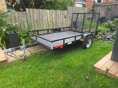 5x8 utility trailer with drop down gate. Fantastic condition. Must register as homemade. Pickup owen...
