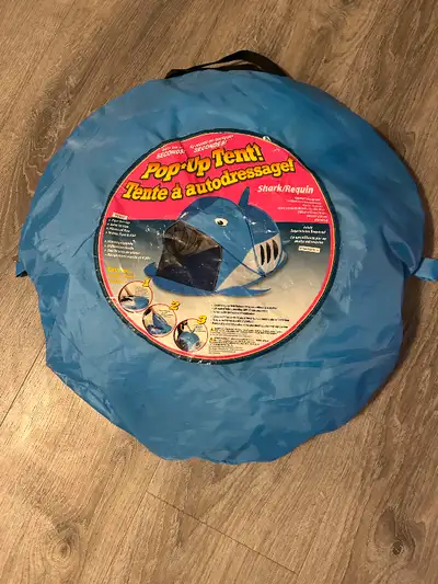 Small pop-up shark tent for little kids. Cost is $28 and pick up is in Charleswood.