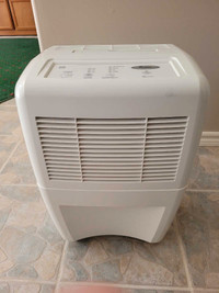 Dehumidifier with water tank collection