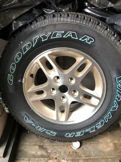 1999 Grand Cherokee JEEP spare tire for sale. 16 inch Never been used. Was in trunk. Then stored ind...