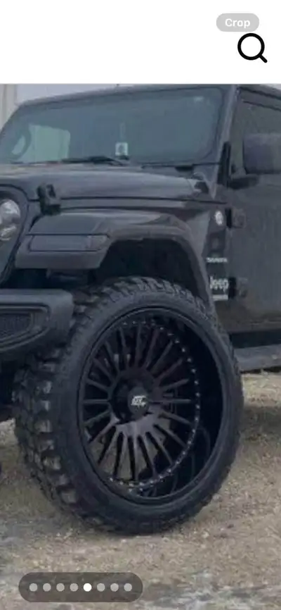 Upgrade your ride with this set of five aggressive off-road tires mounted on premium black aftermark...